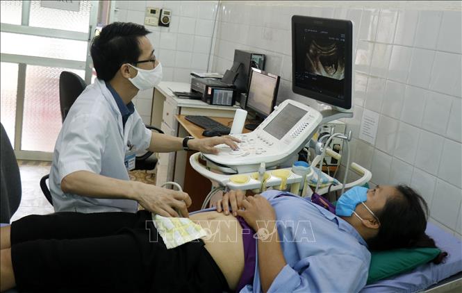 Trong ảnh: Hoạt động khám chữa bệnh tại Bệnh viện Đa khoa huyện Bảo Yên. Ảnh: Quốc Khánh - TTXVN