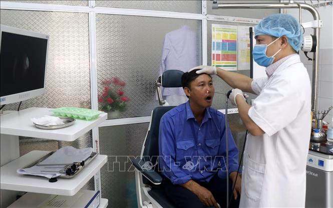 Trong ảnh: Hoạt động khám chữa bệnh tại Bệnh viện Đa khoa huyện Bảo Yên. Ảnh: Quốc Khánh - TTXVN