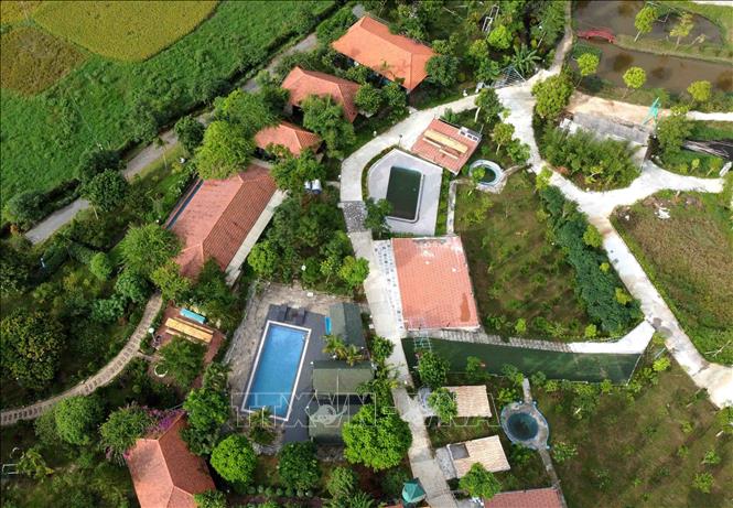 Trong ảnh: Khu nghỉ dưỡng Hidden Hill Resort tại xã Ngọc Thanh, thành phố Phúc Yên, tỉnh Vĩnh Phúc có nhiều sai phạm trong xây dựng và chuyển đổi mục đích sử dụng đất. Ảnh: Hoàng Hùng - TTXVN