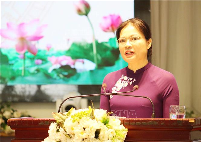 Trong ảnh: Chủ tịch Hội liên hiệp Phụ nữ Việt Nam Hà Thị Nga trình bày tham luận. Ảnh: Nguyễn Oanh - TTXVN