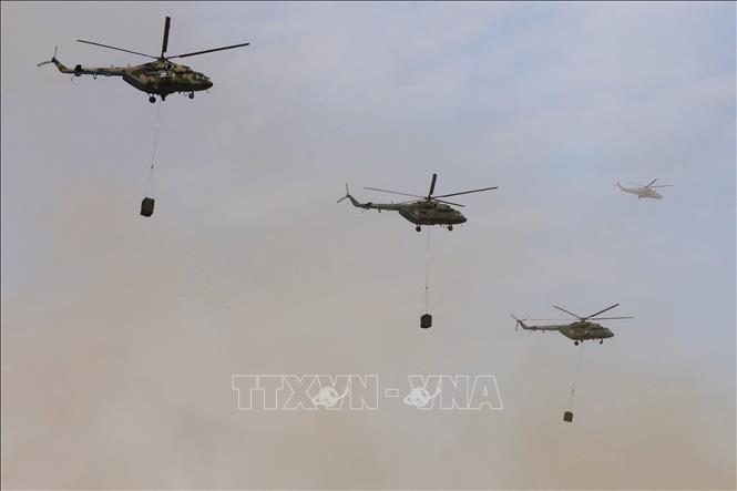 Trong ảnh: Trực thăng vận tải vũ khí, thiết bị tăng cường cho mặt trận. Ảnh: Duy Trinh - Pv TTXVN tại Nga