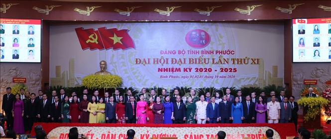 Trong ảnh: Các đồng chí Uỷ viên ban chấp hành Đảng bộ tỉnh Bình Phước khoá XI, nhiệm kỳ 2020 – 2025 ra mắt Đại hội. Ảnh: Sỹ Tuyên – TTXVN