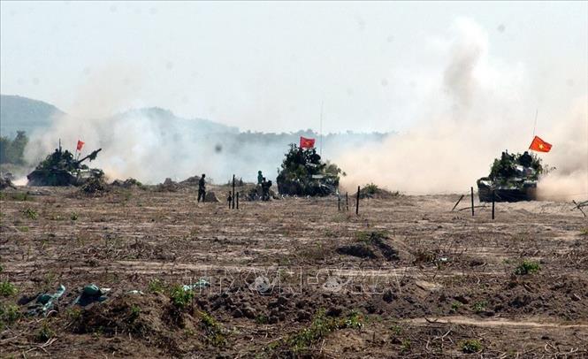 Trong ảnh: Trung đoàn 22 ( Binh đoàn Cửu Long) đã hoàn thành tốt các bài tập huấn cơ bản, sát thực thế thao trường, bảo đảm phương tiện, cơ giới tốt, vận hành an toàn (2010). Ảnh: Trọng Đức - TTXVN