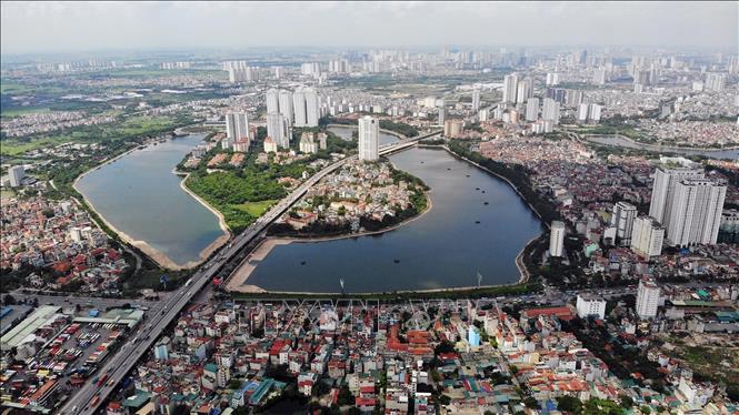 Photo:  Bird's eye view of Linh Dam lake in Hoang Mai district. VNA Photo: Thành Đạt