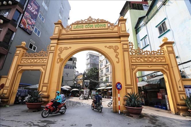 Photo: The entrance gate to Vong village. VNA Photo: Thành Đạt