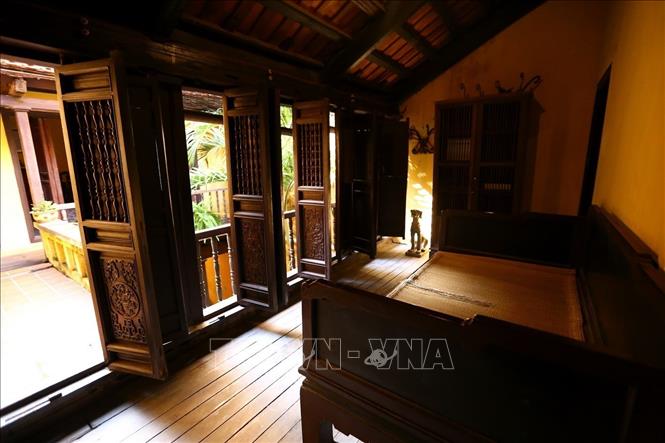 Photo: The room on the next floor is living room to host the guests and worship the ancestor also. VNA Photo