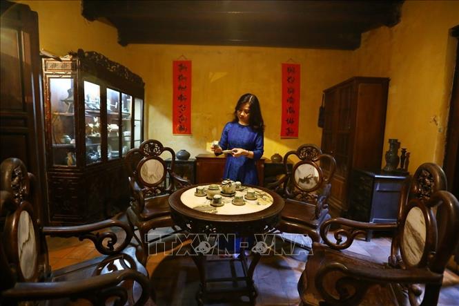 Photo: The room on the next floor is living room to host the guests and worship the ancestor also. VNA Photo