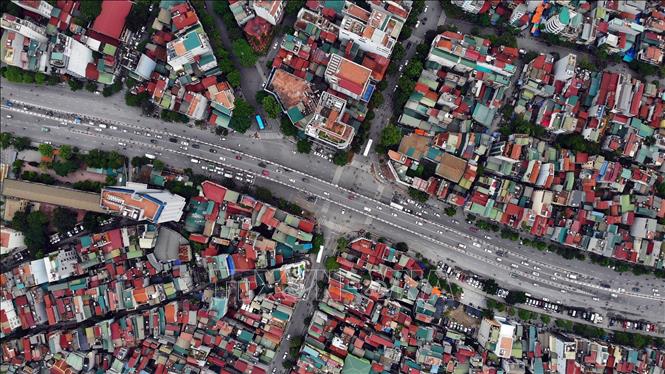 Trong ảnh: Ô Cầu Dền chính là ngã tư lớn nối 4 tuyến phố Huế, Bạch Mai, Trần Khát Chân, Đại Cồ Việt. Ảnh: Danh Lam-TTXVN