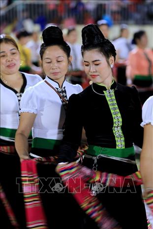 Trong ảnh: Các cô gái Thái duyên dáng, xinh đẹp tại Lễ hội. Ảnh: Thành Đạt - TTXVN