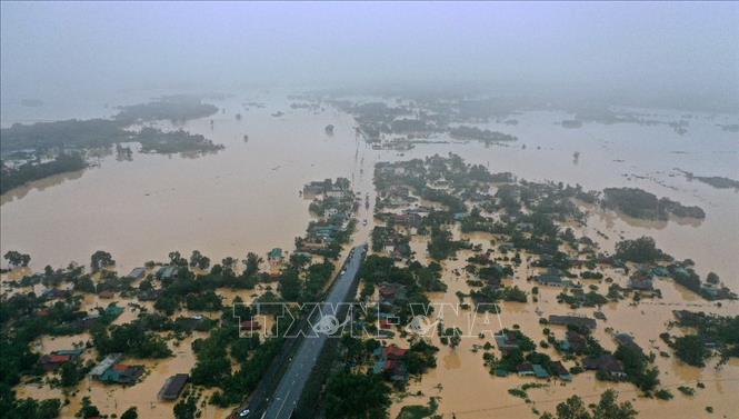 Trong ảnh: Lũ lớn trên sông Hiếu gây ngập diện rộng tại khu vực xã Thanh An, huyện Cam Lộ và phường Đông Giang, thành phố Đông Hà, tỉnh Quảng Trị. Ảnh: Hồ Cầu – TTXVN