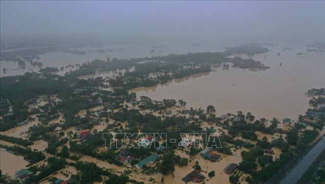 Trong ảnh: Lũ lớn trên sông Hiếu gây ngập diện rộng tại khu vực xã Thanh An, huyện Cam Lộ và phường Đông Giang, thành phố Đông Hà, tỉnh Quảng Trị. Ảnh: Hồ Cầu – TTXVN