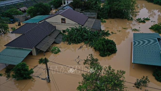 Trong ảnh: Lũ lớn trên sông Hiếu gây ngập diện rộng tại khu vực xã Thanh An, huyện Cam Lộ và phường Đông Giang, thành phố Đông Hà, tỉnh Quảng Trị. Ảnh: Hồ Cầu – TTXVN