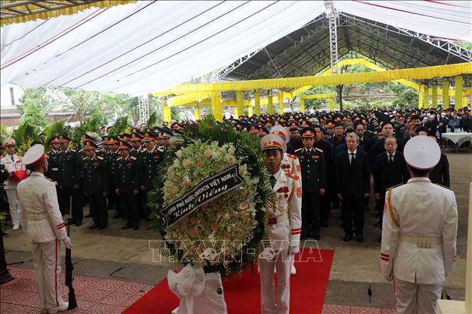 Trong ảnh: Lễ tang 13 cán bộ, chiến sĩ đã hy sinh được tổ chức trọng thể tại Nhà tang lễ Bệnh viện 268. Ảnh: Đỗ Trưởng-TTXVN