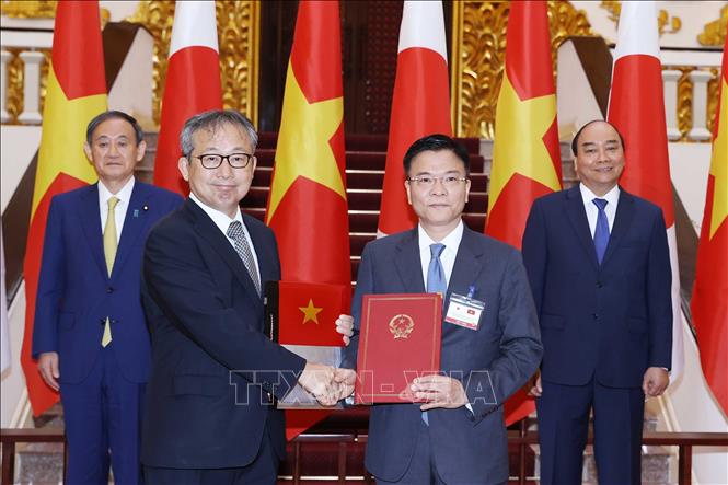 Photo: Signing a MoU between the two countries' Ministries of Justice. VNA Photo: Thống Nhất