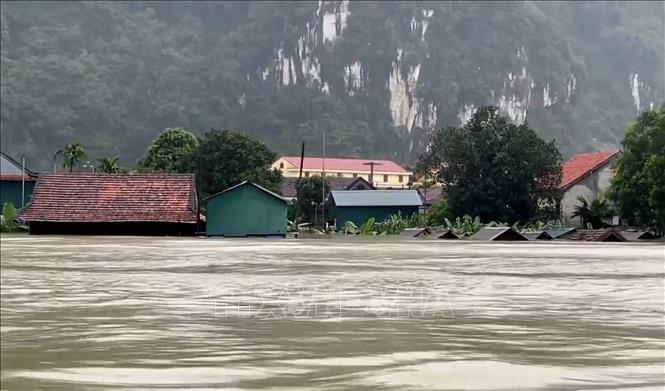 Trong ảnh: Hơn 95 nghìn ngôi nhà tại Quảng Bình bị lũ nhấn chìm. Ảnh: Đức Thọ -TTXVN