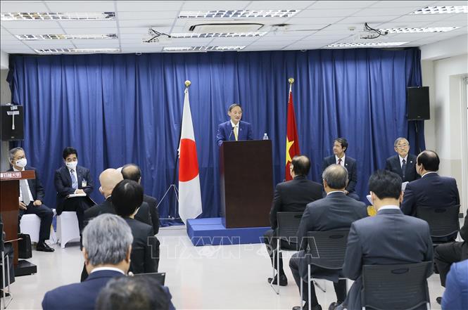 Photo: Japanese Prime Minister Suga Yoshihide speaks at the Vietnam - Japan University. VNA Photo: Doãn Tấn