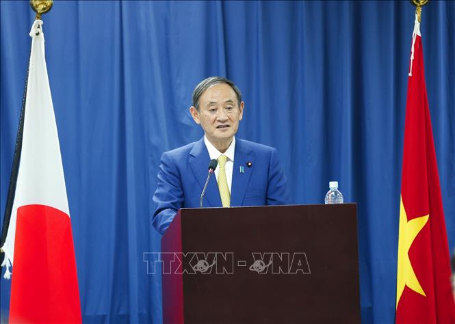 Photo: Japanese Prime Minister Suga Yoshihide speaks at the Vietnam - Japan University. VNA Photo: Doãn Tấn