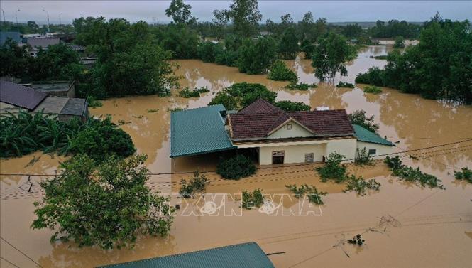Trong ảnh: Lũ lớn trên sông Hiếu gây ngập diện rộng tại khu vực xã Thanh An, huyện Cam Lộ, tỉnh Quảng Trị. Ảnh: Hồ Cầu - TTXVN

