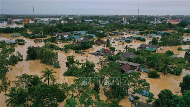 Trong ảnh: Lũ lớn trên sông Hiếu gây ngập diện rộng tại khu vực xã Thanh An, huyện Cam Lộ, tỉnh Quảng Trị. Ảnh: Hồ Cầu - TTXVN

