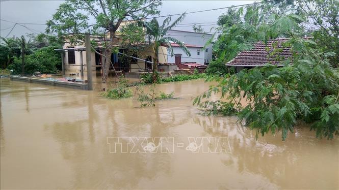 Trong ảnh: Nước vẫn ngập sâu tại khu vực xã Hàm Ninh, huyện Quảng Ninh, tỉnh Quảng Bình. Ảnh: Văn Tý-TTXVN

