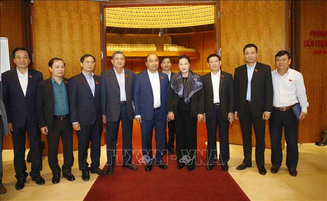 Trong ảnh: Thủ tướng Nguyễn Xuân Phúc, Chủ tịch Quốc hội Nguyễn Thị Kim Ngân và các đại biểu dự phiên họp. Ảnh: Doãn Tấn - TTXVN