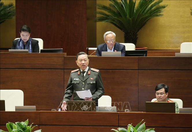 Trong ảnh: Bộ trưởng Bộ Công an Tô Lâm báo cáo, làm rõ một số vấn đề đại biểu Quốc hội nêu. Ảnh: Doãn Tấn - TTXVN