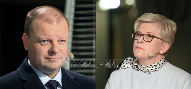 Trong ảnh: Thủ tướng đương nhiệm Litva đồng thời là lãnh đạo đảng Xanh và Nông dân Saulius Skvernelis (trái) và ứng viên tranh cử Thủ tướng của đảng Liên minh Tổ quốc Ingrida Simonyte. Ảnh: AFP/TTXVN