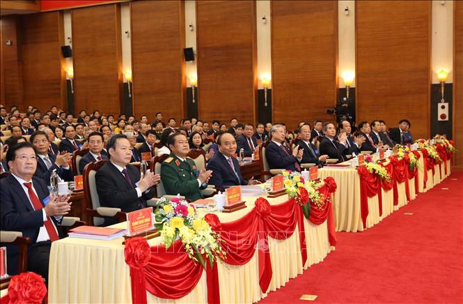 Trong ảnh: Thủ tướng Nguyễn Xuân Phúc và các đồng chí lãnh đạo Đảng, Nhà nước dự Đại hội. Ảnh: Dương Giang - TTXVN