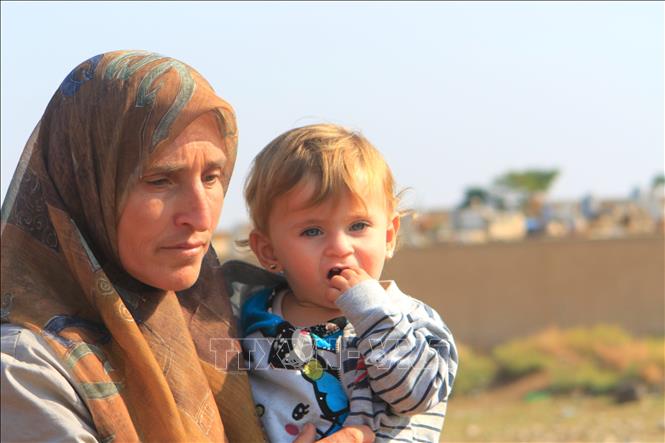 Trong ảnh: Phụ nữ và trẻ em luôn là nạn nhân chịu nhiều đau thương và mất mát trong các cuộc xung đột vũ trang. Ảnh: Trần Hiếu - Pv TTXVN