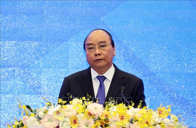 Photo: Vietnamese Prime Minister Nguyen Xuan Phuc, ASEAN 2020 Chair speaks at the closing ceremony. VNA Photo: Thống Nhất