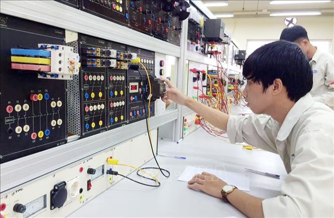 Trong ảnh: Đào tạo HSSV tại nhà trường . Ảnh: Anh Tuấn – TTXVN