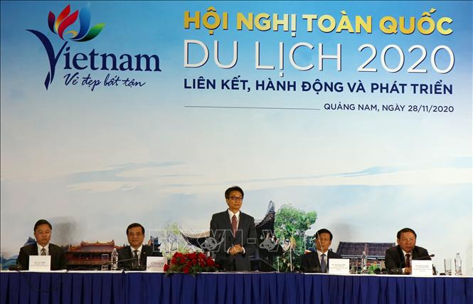 Photo: Deputy Prime Minister Vu Duc Dam speaks at the conference. VNA Photo: Trần Tĩnh