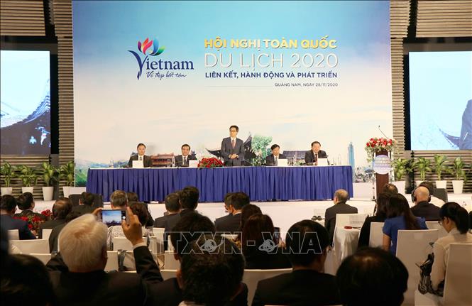 Photo: Deputy Prime Minister Vu Duc Dam speaks at the conference. VNA Photo: Trần Tĩnh