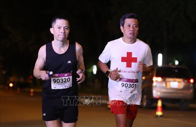 Trong ảnh: Ông Đoàn Ngọc Hải, nguyên Phó Chủ tịch UBND Q1 TP Hồ Chí Minh tham gia giải chạy. Ảnh: Thành Đạt - TTXVN