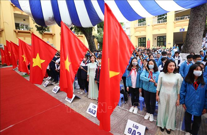 Trong ảnh: Nghi lễ chào cờ và hát quốc ca trong lễ kỷ niệm. Ảnh: Thanh Tùng - TTXVN