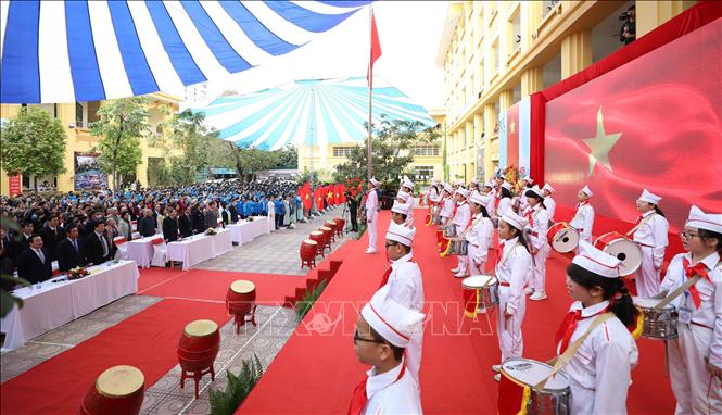 Trong ảnh: Nghi lễ chào cờ và hát quốc ca trong lễ kỷ niệm. Ảnh: Thanh Tùng - TTXVN