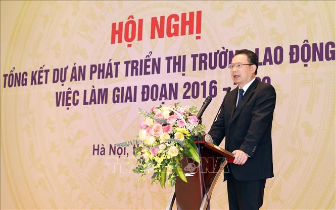 Trong ảnh: Thứ trưởng Bộ Lao động – Thương binh và Xã hội Lê Văn Thanh phát biểu khai mạc Hội nghị. Ảnh: Anh Tuấn – TTXVN