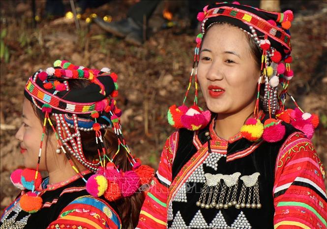 Photo: Everyone is decked out in colourful dresses during Tet. VNA Photo: Xuân Tiến