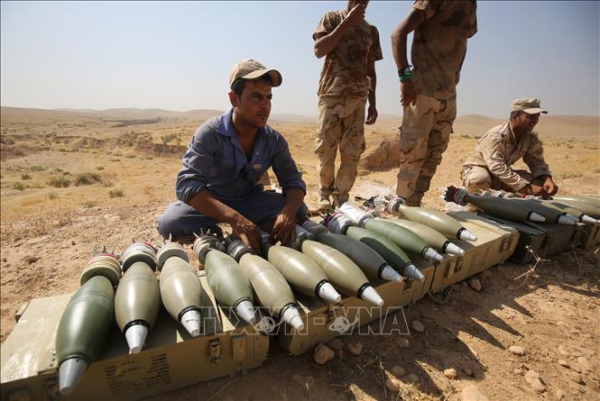 Trong ảnh (tư liệu): Các lực lượng Iraq tham gia chiến dịch truy quét IS tại làng al-Ayadieh, gần Qubuq, phía bắc Tal Afar, Iraq, ngày 28/8/2017. Ảnh: AFP/ TTXVN