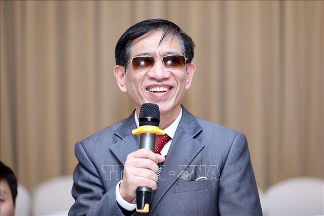 Trong ảnh: Ông Trần Viết Thu, Chủ tịch Hội người mù Việt Nam trình bày tham luận tại Hội nghị. Ảnh: Anh Tuấn – TTXVN 