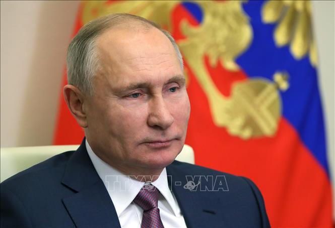 Trong ảnh: Tổng thống Nga Vladimir Putin phát biểu trong một cuộc họp trực tuyến tại Novo-Ogaryovo, Moskva, ngày 24/12/2020. Ảnh: AFP/ TTXVN