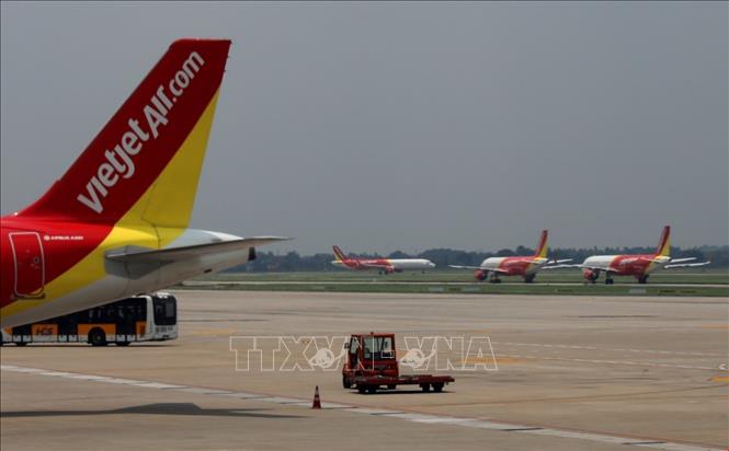 Photo: Vietjet Air planes at Noi Bai International Airportin Hanoi. VNA Photo: Ngọc Hà