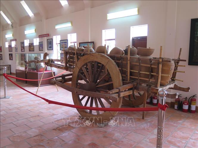 Photo: One of the remaining three wooden carriages on display. VNA Photo: Minh Hưng