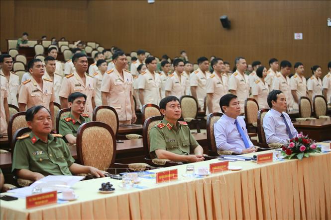Trong ảnh: Các cán bộ, chiến sỹ của Phòng PA05, đơn vị mới của Công an Thành phố Hồ Chí Minh đứng nghe công bố quyết định. Ảnh: Thành Chung - TTXVN