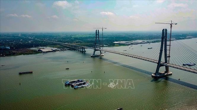 Đã đưa một số công trình, dự án giao thông quan trọng vào sử dụng. Trong ảnh: Cầu Vàm Cống bắc qua sông Hậu, nối huyện Lấp Vò (Đồng Tháp) và quận Thốt Nốt (thành phố Cần Thơ), tổng mức đầu tư hơn 271 triệu USD. Ảnh: TTXVN phát
