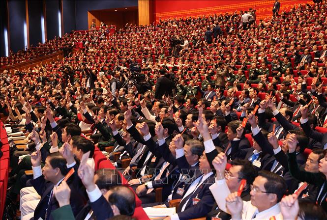Photo: Delegates approves the congress’s working rules. VNA Photo