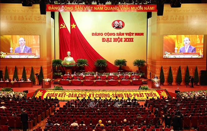 Photo: Prime Minister Nguyen Xuan Phuc, on behalf of the Presidium delivers the Congress’s opening speech. VNA Photo