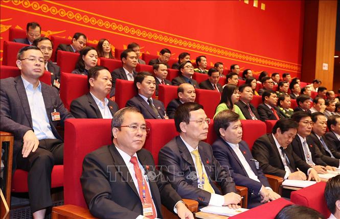 Photo: Delegates attend the third working day. VNA Photo