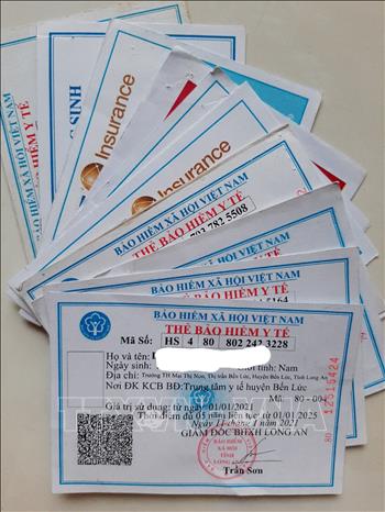 Trong ảnh: Tỉnh Long An luôn chú trọng công tác bảo hiểm y tế cho học sinh, sinh viên. Ảnh: Đức Hạnh - TTXVN 
