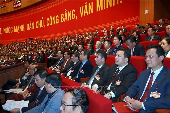 Trong ảnh: Các đại biểu dự phiên thảo luận các văn kiện Đại hội sáng 28/1. Ảnh: TTXVN

